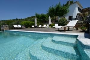 Bazén v ubytování Esperos Suites & Villas nebo v jeho okolí