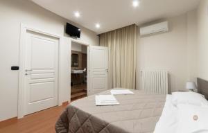 Postel nebo postele na pokoji v ubytování Opera B&B