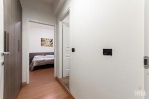 Postel nebo postele na pokoji v ubytování Opera B&B