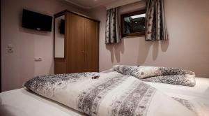 Ein Bett oder Betten in einem Zimmer der Unterkunft Apart Anja