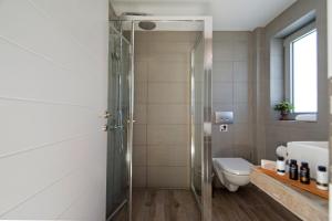 Koupelna v ubytování Lidea Boutique Hotel + 37 fotografií