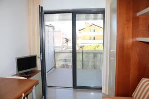 
TV o dispositivi per l'intrattenimento presso Apartments in Lignano 21632
