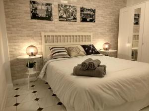 Posteľ alebo postele v izbe v ubytovaní Apartamento Capuchinos