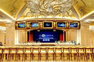 TV a/nebo společenská místnost v ubytování NagaWorld Hotel & Entertainment Complex