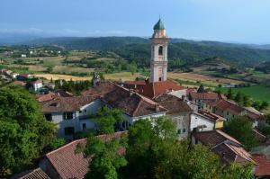 a view of a town with a clock tower at Cà da Nonna in Pareto