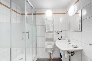 Kúpeľňa v ubytovaní Hotel Pivovar Kácov + 23 fotografií