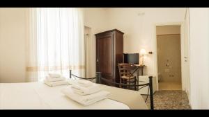 Televízia a/alebo spoločenská miestnosť v ubytovaní Bed & Breakfast AMATI
