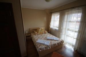 Postelja oz. postelje v sobi nastanitve Panorama Yasinya