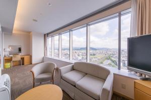TV a/nebo společenská místnost v ubytování Hotel Landmark Wakayama
