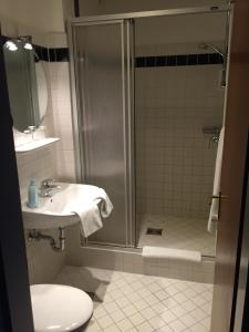 Koupelna v ubytování Hotel Süderelbe