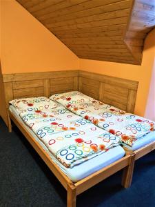 Postel nebo postele na pokoji v ubytování Apartmány Sára