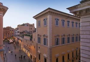 a view of a street in a city with buildings at Boutique Centrale Palace Hotel in Rome
