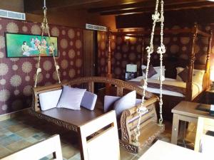 TV a/nebo společenská místnost v ubytování Hotel Oxina Lygon