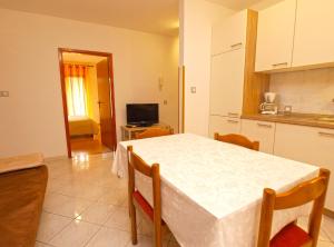 Kuchyň nebo kuchyňský kout v ubytování Apartment Cocaletto 1047