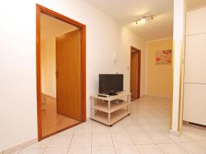 TV a/nebo společenská místnost v ubytování Apartment Cocaletto 1047