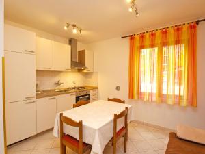 Kuchyň nebo kuchyňský kout v ubytování Apartment Cocaletto 1047