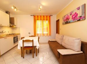 Kuchyň nebo kuchyňský kout v ubytování Apartment Cocaletto 1047