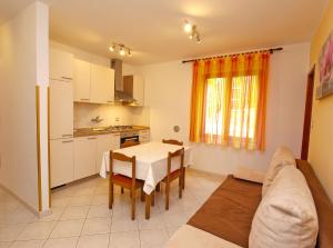 Kuchyň nebo kuchyňský kout v ubytování Apartment Cocaletto 1047