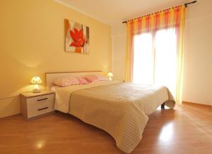Postel nebo postele na pokoji v ubytování Apartment Cocaletto 1047