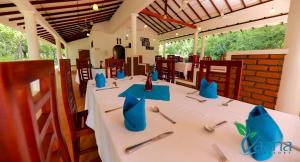 Reštaurácia alebo iné gastronomické zariadenie v ubytovaní Vaana Resort