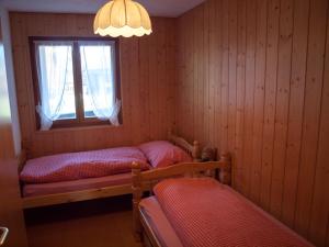 Postel nebo postele na pokoji v ubytování Chalet Silberdistel