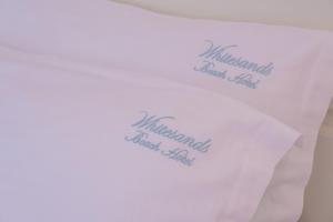 Кровать или кровати в номере WhiteSands Beach Resort