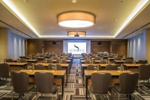 a large conference room with tables and chairs at Surmeli Istanbul Hotel in Istanbul +37 photos