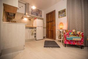 Kuchyňa alebo kuchynka v ubytovaní Buddhalounge Apartments