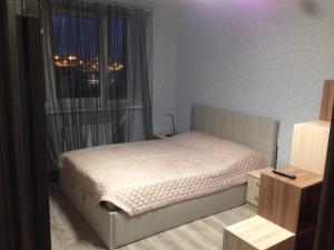 
A bed or beds in a room at Apartment on Pulkovskoe
