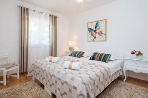 Postel nebo postele na pokoji v ubytování Holiday Home Brac