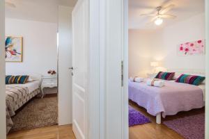 Postel nebo postele na pokoji v ubytování Holiday Home Brac