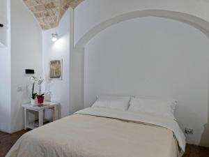 Le Stalle del Seminario tesisinde bir odada yatak veya yataklar