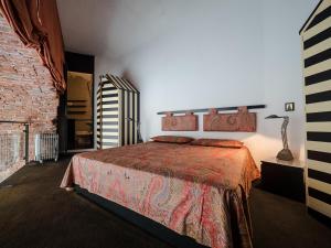 Ένα ή περισσότερα κρεβάτια σε δωμάτιο στο La Casa del Gigante Luxury Collection