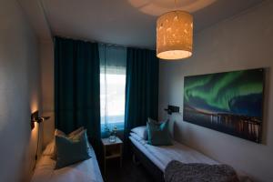 Postel nebo postele na pokoji v ubytování Breidablikk Guesthouse