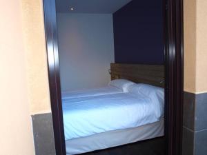 Кровать или кровати в номере Hotel Las Casas de Pandreula