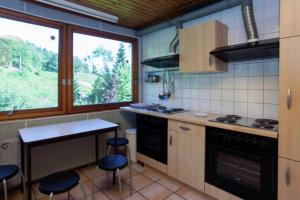 Una cocina o kitchenette en Les 3 Canards