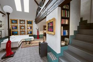 Un lugar para sentarse en Apartman atelier Paral