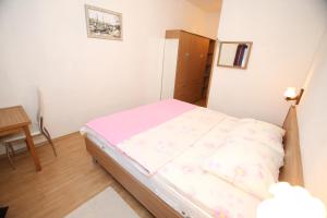 Postel nebo postele na pokoji v ubytování Rooms with the Sea View