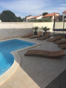 Bazén v ubytovaní Villa Palatium I alebo v jeho blízkosti