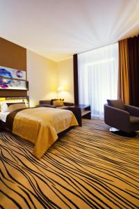 Postel nebo postele na pokoji v ubytování Blue Diamond Hotel Active SPA