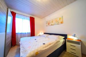 Postel nebo postele na pokoji v ubytování Privatzimmer Haus Erika