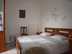 Postel nebo postele na pokoji v ubytování Batika Rooms