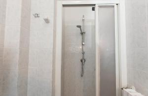 Koupelna v ubytování Hotel Greco