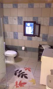 A bathroom at Traditional House Koukounara