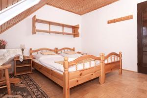 Кровать или кровати в номере Privát Gallik
