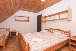 Posteľ alebo postele v izbe v ubytovaní Privát Gallik