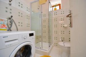 Kúpeľňa v ubytovaní Apartman Perović + 24 fotografií