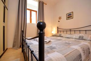 Posteľ alebo postele v izbe v ubytovaní Apartman Perović