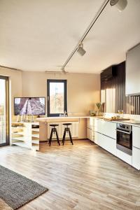 Kuchyňa alebo kuchynka v ubytovaní Forest Park by Zoom Apartments