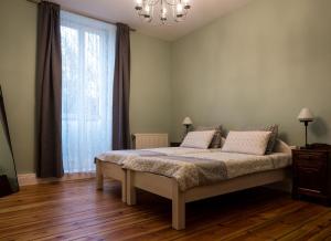 Postel nebo postele na pokoji v ubytování Bürgerpark Apartments